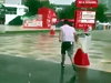 Successfully Tackles His Mates Walking In The Rain