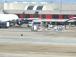 Suitcase Rolling Around An Airport Looking For Its Owner
