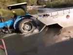 Tractor Unloading From A Barge Suffers A Mishap
