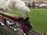 Train Line Runs Through A Soccer Stadium
