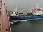 Trawler Somehow Collides With A Huge Carrier
