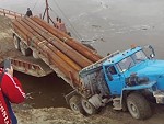 Truck Loading Onto A Barge Does Not Go To Plan
