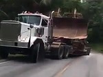 Turns Out Truck Can't Pull An Excavator Up The Hill
