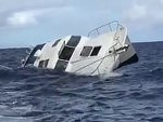 Twin Hull Boat Goes Down Before They Can Tow It In
