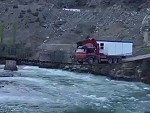 Very Heavy Truck Crosses A Very Puny Bridge
