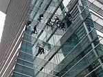 Window Cleaners Hard At Work High Above Bangkok
