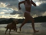 Woman And Her Dog Running On The Beach So Gracefully Until
