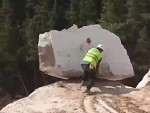 Worker Pushed A Huge Boulder Off A Mountain
