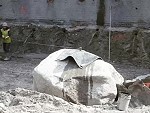 Worker Splits A Huge Boulder With Explosives
